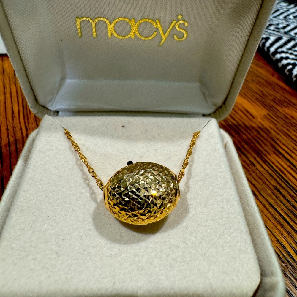 Never worn necklace from Macy's. Bridge gold jewelry 14K basic novelty.
